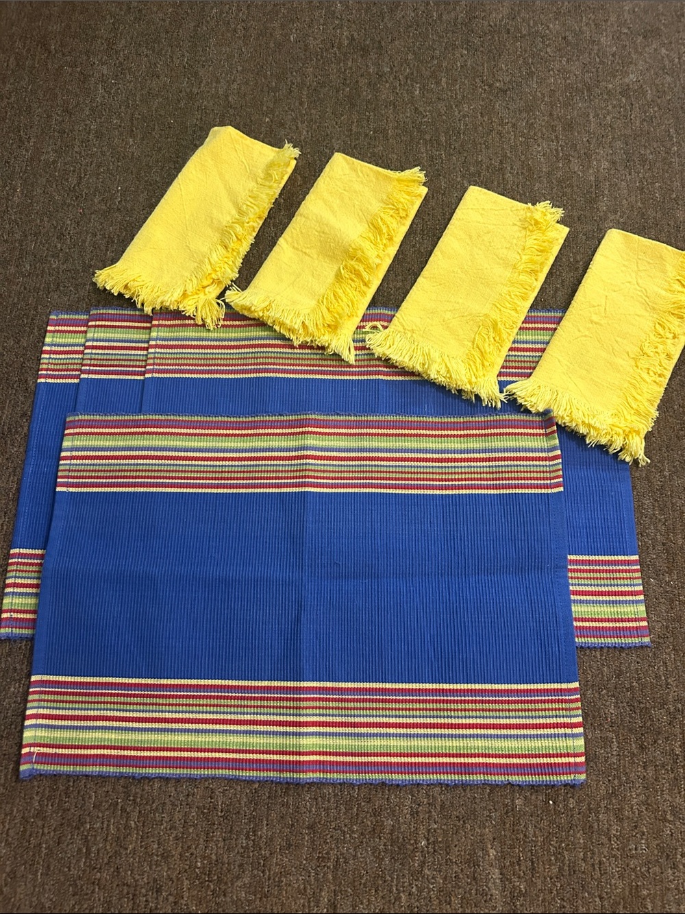 4 Vintage New Dead Stock Blue Striped  
Placemats with 4  Yellow Fringe Napkins